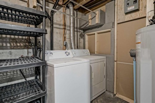 252 Allan Crescent Se, Calgary, AB - Indoor Photo Showing Laundry Room