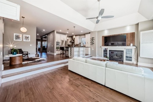 55 Aspen Meadows Green Sw, Calgary, AB - Indoor Photo Showing Living Room With Fireplace