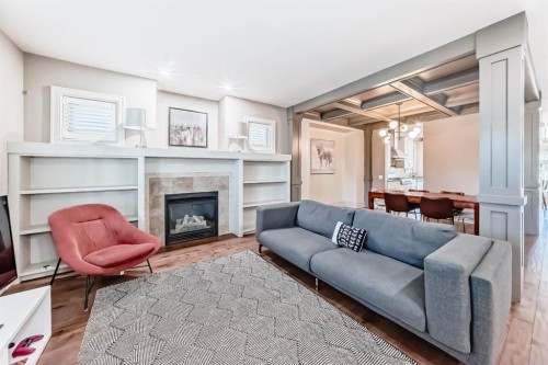 55 Aspen Meadows Green Sw, Calgary, AB - Indoor Photo Showing Living Room With Fireplace