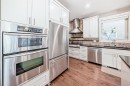 55 Aspen Meadows Green Sw, Calgary, AB  - Indoor Photo Showing Kitchen With Stainless Steel Kitchen With Double Sink With Upgraded Kitchen 