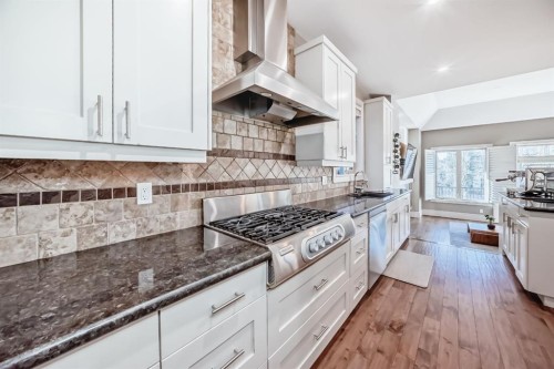 55 Aspen Meadows Green Sw, Calgary, AB - Indoor Photo Showing Kitchen With Upgraded Kitchen