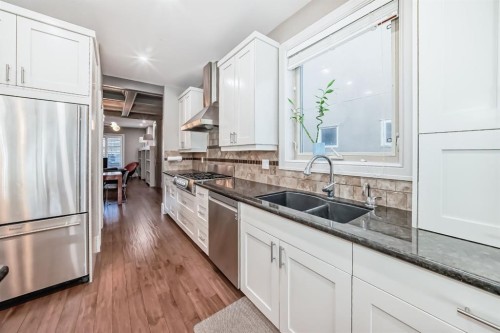 55 Aspen Meadows Green Sw, Calgary, AB - Indoor Photo Showing Kitchen With Double Sink With Upgraded Kitchen