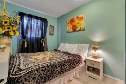 4811 60 Street Ne, Calgary, AB - Indoor Photo Showing Bedroom