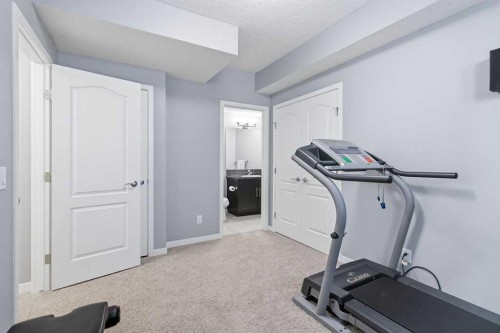 571 Mahogany Boulevard Se, Calgary, AB - Indoor Photo Showing Gym Room