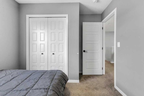 120 Belmont Villas Sw, Calgary, AB - Indoor Photo Showing Bedroom