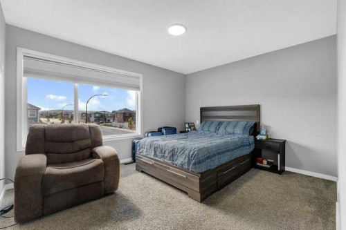 120 Belmont Villas Sw, Calgary, AB - Indoor Photo Showing Bedroom