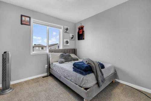 120 Belmont Villas Sw, Calgary, AB - Indoor Photo Showing Bedroom