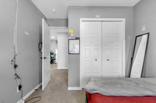 120 Belmont Villas Sw, Calgary, AB - Indoor Photo Showing Bedroom