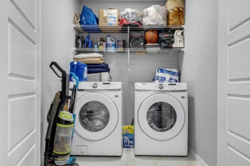 120 Belmont Villas Sw, Calgary, AB - Indoor Photo Showing Laundry Room