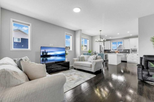 120 Belmont Villas Sw, Calgary, AB - Indoor Photo Showing Living Room