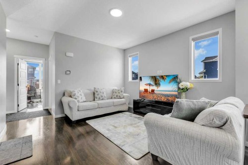 120 Belmont Villas Sw, Calgary, AB - Indoor Photo Showing Living Room