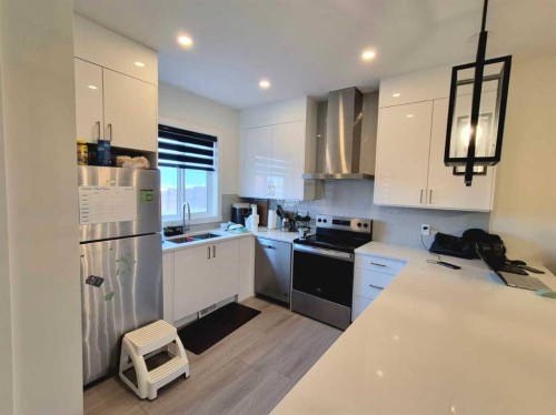 125 Sage Hill Circle, Calgary, AB - Indoor Photo Showing Kitchen With Double Sink