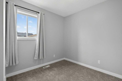 35 Martinview Crescent Ne, Calgary, AB - Indoor Photo Showing Other Room