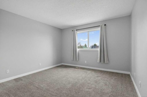 35 Martinview Crescent Ne, Calgary, AB - Indoor Photo Showing Other Room