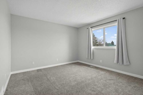 35 Martinview Crescent Ne, Calgary, AB - Indoor Photo Showing Other Room