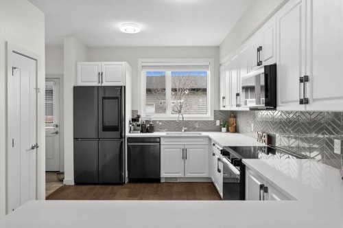 330 Redstone Boulevard Ne, Calgary, AB - Indoor Photo Showing Kitchen With Upgraded Kitchen