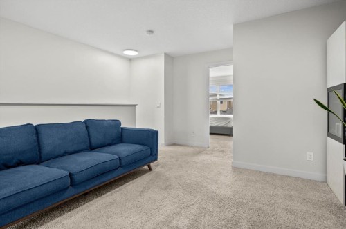 330 Redstone Boulevard Ne, Calgary, AB - Indoor Photo Showing Living Room