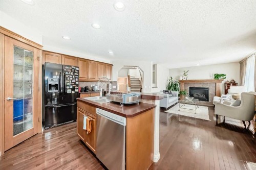 198 Everstone Drive Sw, Calgary, AB - Indoor With Fireplace