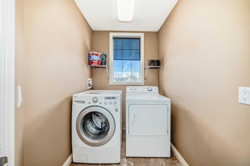 198 Everstone Drive Sw, Calgary, AB - Indoor Photo Showing Laundry Room
