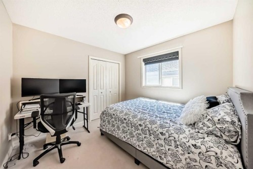 198 Everstone Drive Sw, Calgary, AB - Indoor Photo Showing Bedroom
