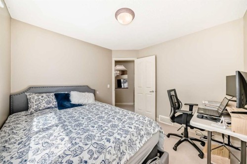 198 Everstone Drive Sw, Calgary, AB - Indoor Photo Showing Bedroom