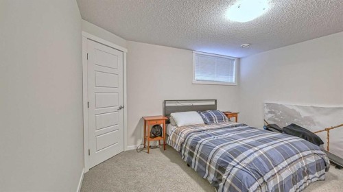 417 Cranbrook Square Se, Calgary, AB - Indoor Photo Showing Bedroom