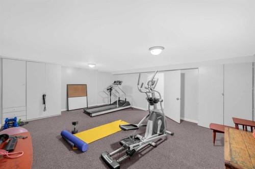 9428 Abbott Place Se, Calgary, AB - Indoor Photo Showing Gym Room