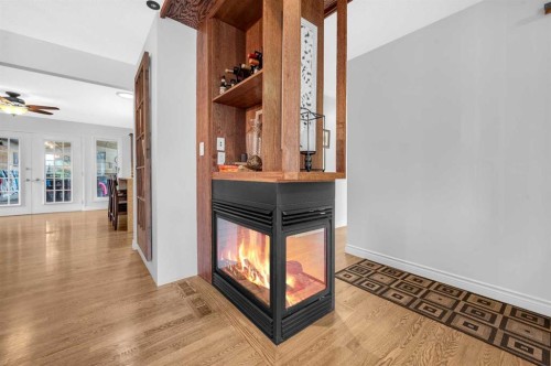 9428 Abbott Place Se, Calgary, AB - Indoor Photo Showing Other Room With Fireplace