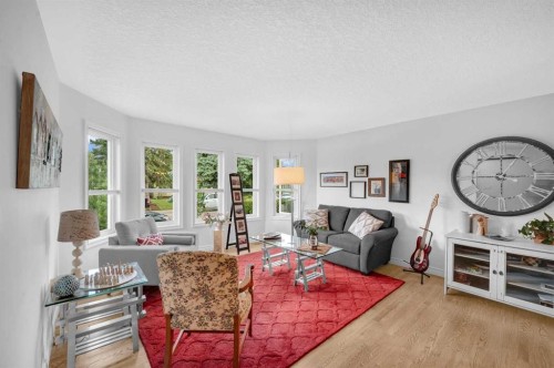 9428 Abbott Place Se, Calgary, AB - Indoor Photo Showing Living Room