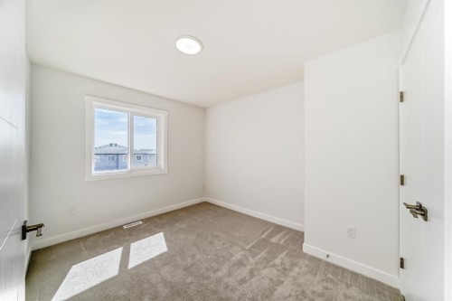 324 Cornerbrook Drive Ne, Calgary, AB - Indoor Photo Showing Other Room