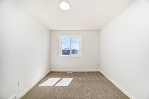 324 Cornerbrook Drive Ne, Calgary, AB - Indoor Photo Showing Other Room
