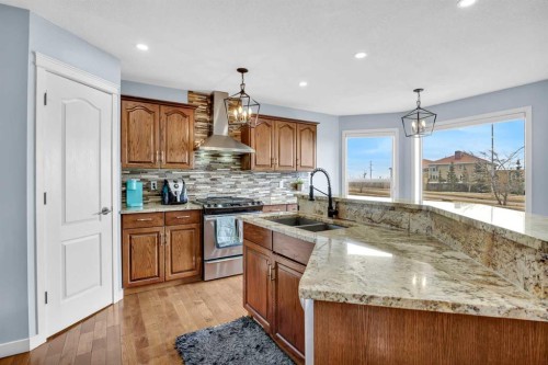 166 Tuscarora Close Nw, Calgary, AB - Indoor Photo Showing Kitchen With Double Sink With Upgraded Kitchen