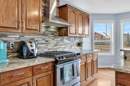 166 Tuscarora Close Nw, Calgary, AB - Indoor Photo Showing Kitchen With Upgraded Kitchen