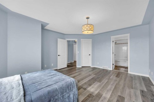 166 Tuscarora Close Nw, Calgary, AB - Indoor Photo Showing Bedroom