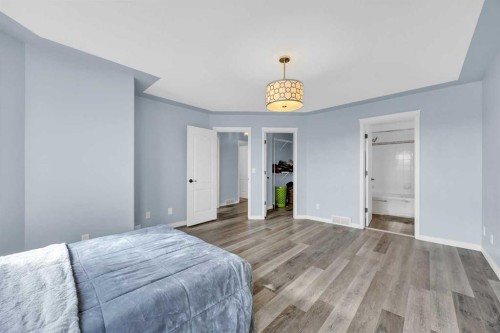 166 Tuscarora Close Nw, Calgary, AB - Indoor Photo Showing Bedroom