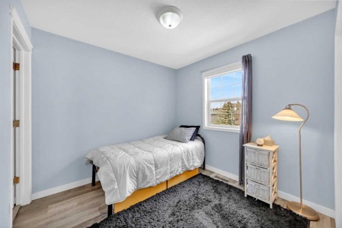 166 Tuscarora Close Nw, Calgary, AB - Indoor Photo Showing Bedroom