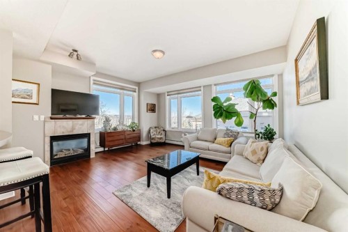 3506-24 Hemlock Crescent Sw, Calgary, AB - Indoor Photo Showing Living Room With Fireplace