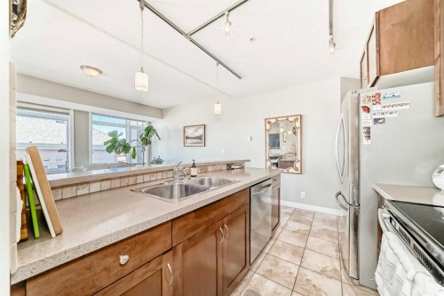 3506-24 Hemlock Crescent Sw, Calgary, AB - Indoor Photo Showing Kitchen With Double Sink
