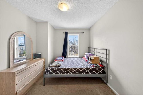 244 Silverado Range View Sw, Calgary, AB - Indoor Photo Showing Bedroom