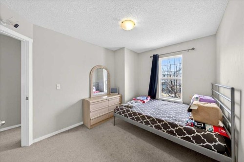 244 Silverado Range View Sw, Calgary, AB - Indoor Photo Showing Bedroom