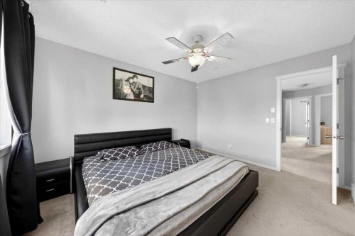244 Silverado Range View Sw, Calgary, AB - Indoor Photo Showing Bedroom