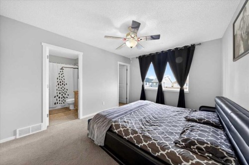 244 Silverado Range View Sw, Calgary, AB - Indoor Photo Showing Bedroom