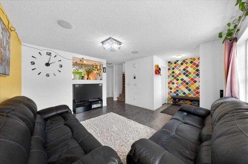 244 Silverado Range View Sw, Calgary, AB - Indoor Photo Showing Living Room