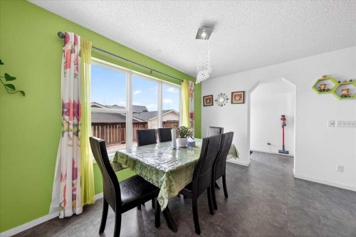 244 Silverado Range View Sw, Calgary, AB - Indoor Photo Showing Dining Room