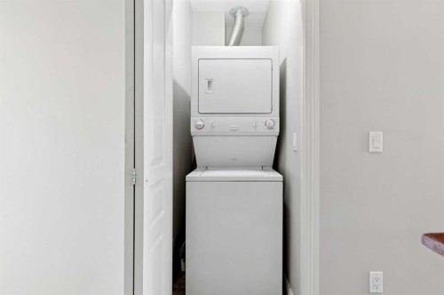 14-169 Rockyledge View Nw, Calgary, AB - Indoor Photo Showing Laundry Room