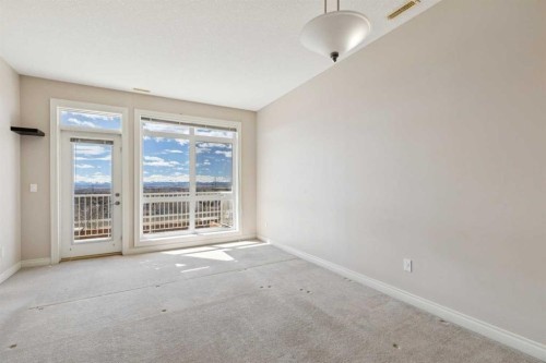 14-169 Rockyledge View Nw, Calgary, AB - Indoor Photo Showing Other Room