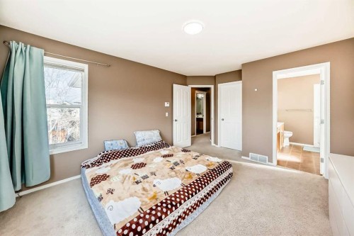 250 Royal Birch Way Nw, Calgary, AB - Indoor Photo Showing Bedroom