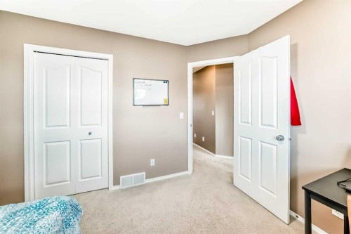250 Royal Birch Way Nw, Calgary, AB - Indoor Photo Showing Bedroom