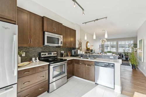46 Kinlea Common Nw, Calgary, AB - Indoor Photo Showing Kitchen With Stainless Steel Kitchen With Double Sink With Upgraded Kitchen