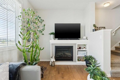 46 Kinlea Common Nw, Calgary, AB - Indoor Photo Showing Living Room With Fireplace